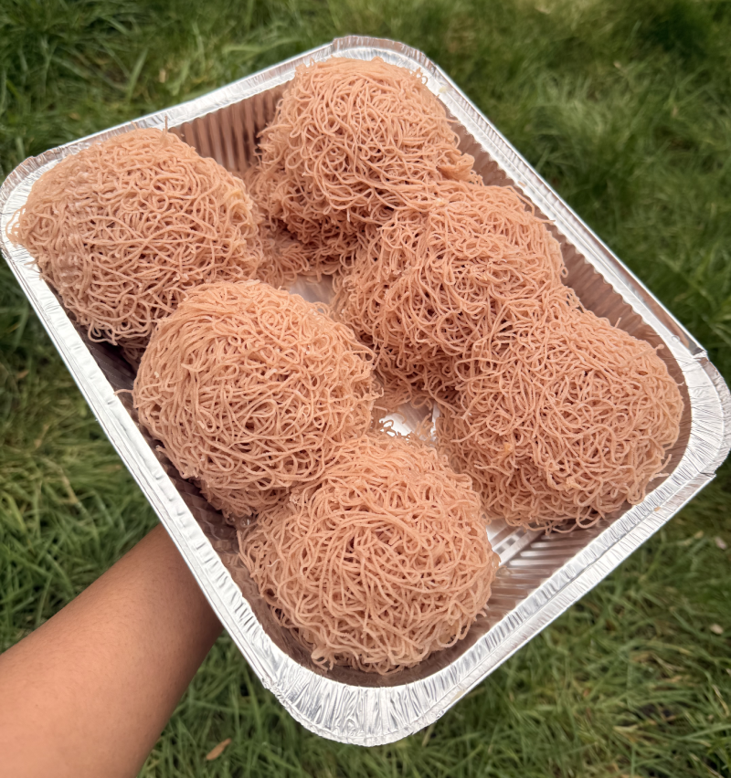 Traditional Sri Lankan red string hoppers (Idiyappam) served for event catering in Sheffield.